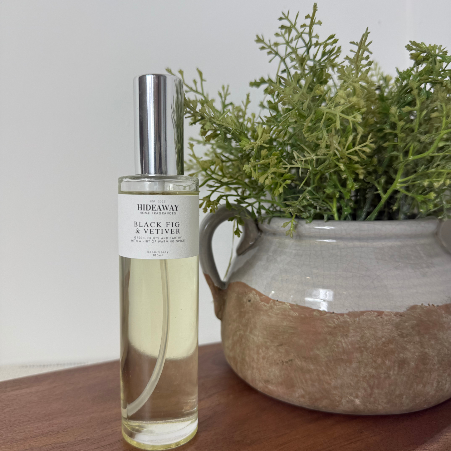 Sophisticated room spray with juicy fig, oak moss, and cedarwood – inspired by fig orchards and open fields - Hideaway Home Fragrances