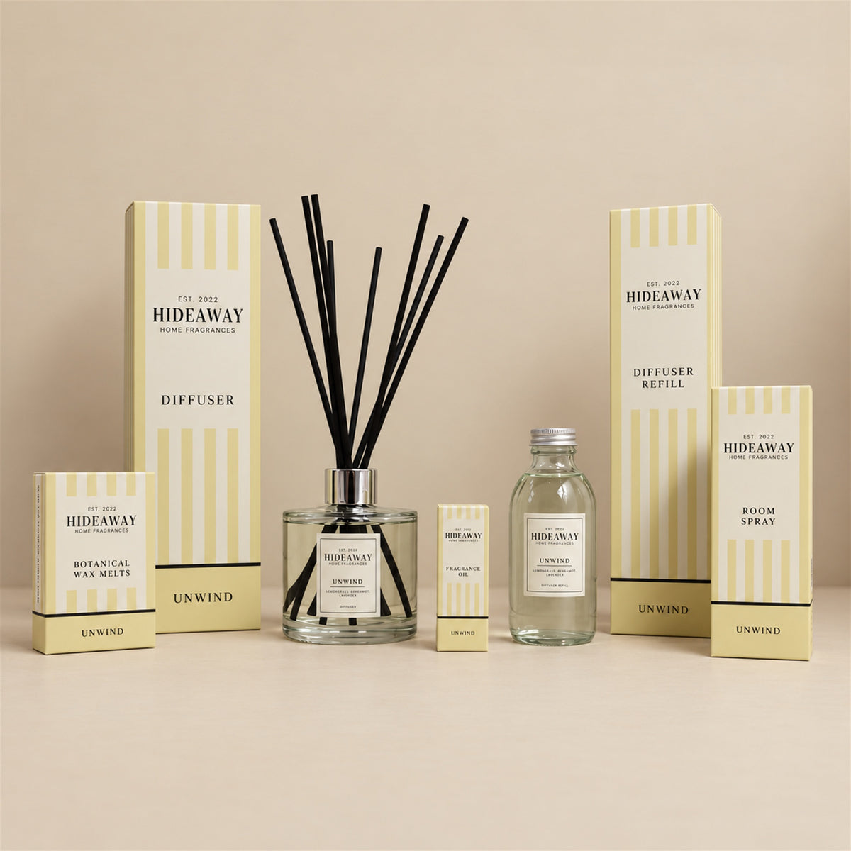 Hideaway Home Fragrances unwind collection including diffusers, candles, wax melts, and room sprays