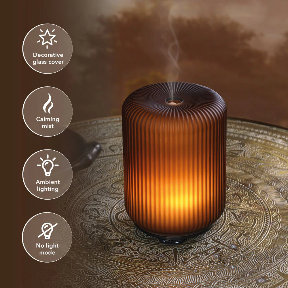 elegant glass Cara Aroma Wellbeing Diffuser: Transform your space into a serene sanctuary with calming fragrance. - Hideaway Home Fragrances