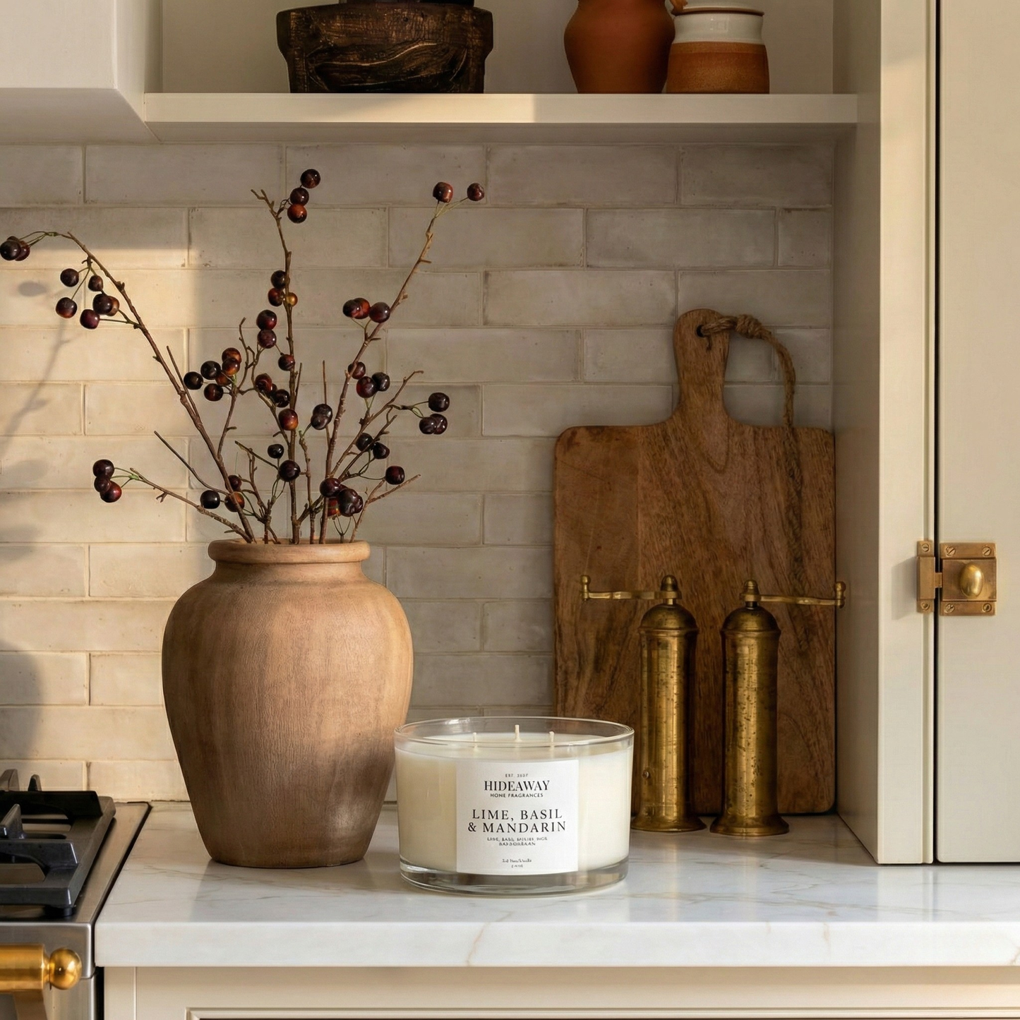 Invigorating Lime, Basil & Mandarin three-wick candle filling a living space with crisp, vibrant Caribbean-inspired scent