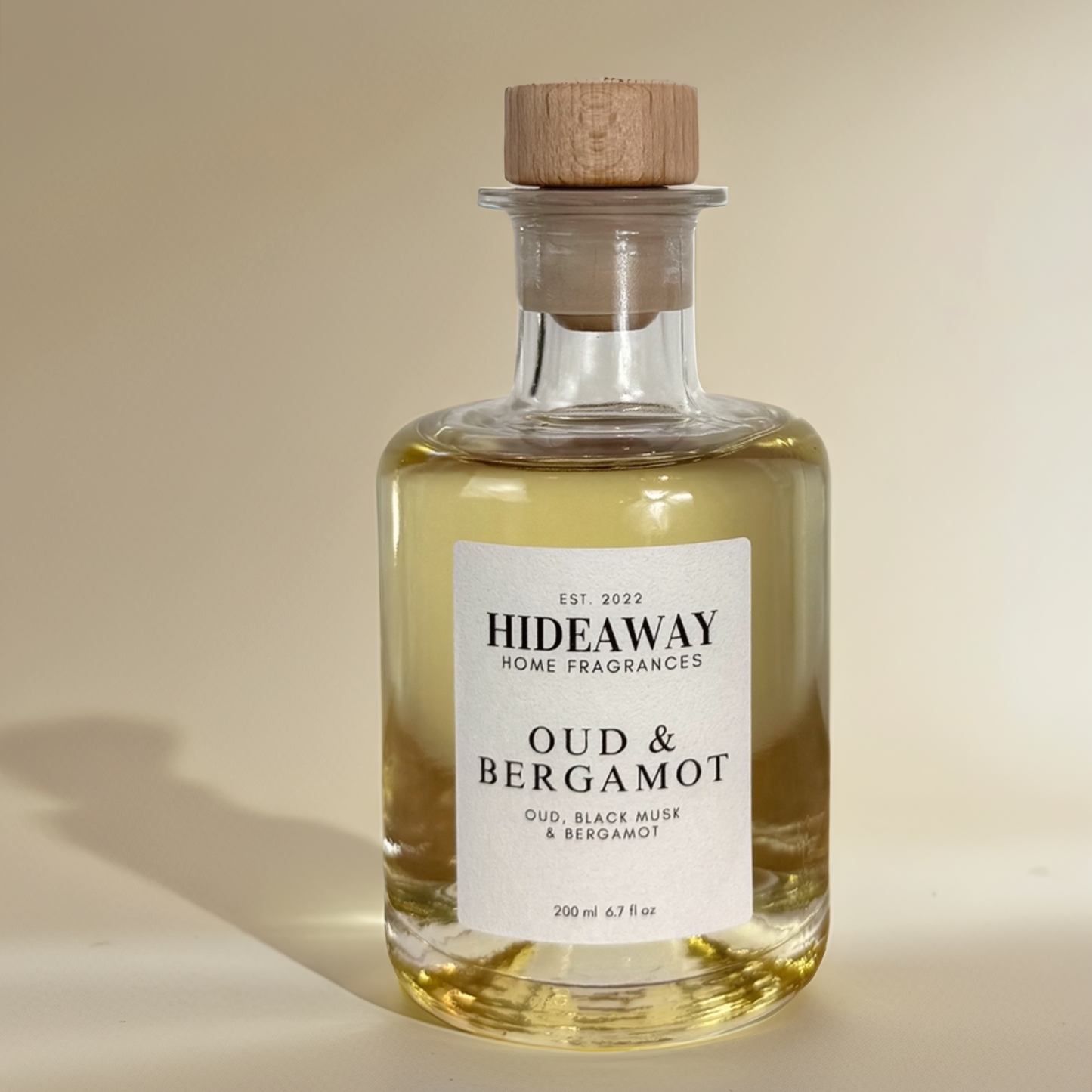 Bold and opulent 200ml reed diffuser with bergamot, oud, and velvety musk - Hideaway Home Fragrances