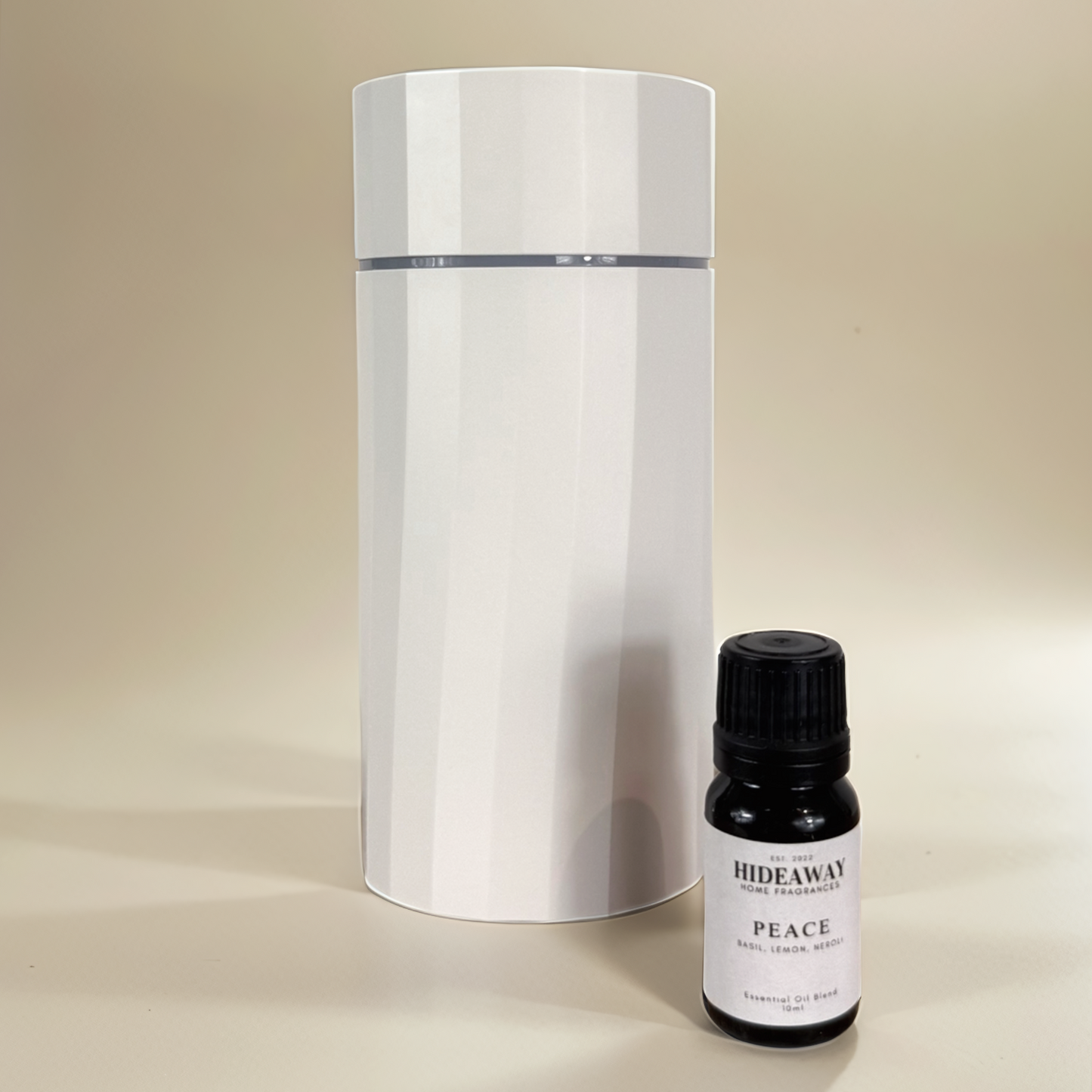 Calming Peace blend featuring citrus lemon, soothing neroli, and herbal basil to promote focus and emotional balance — Hideaway Home Fragrances