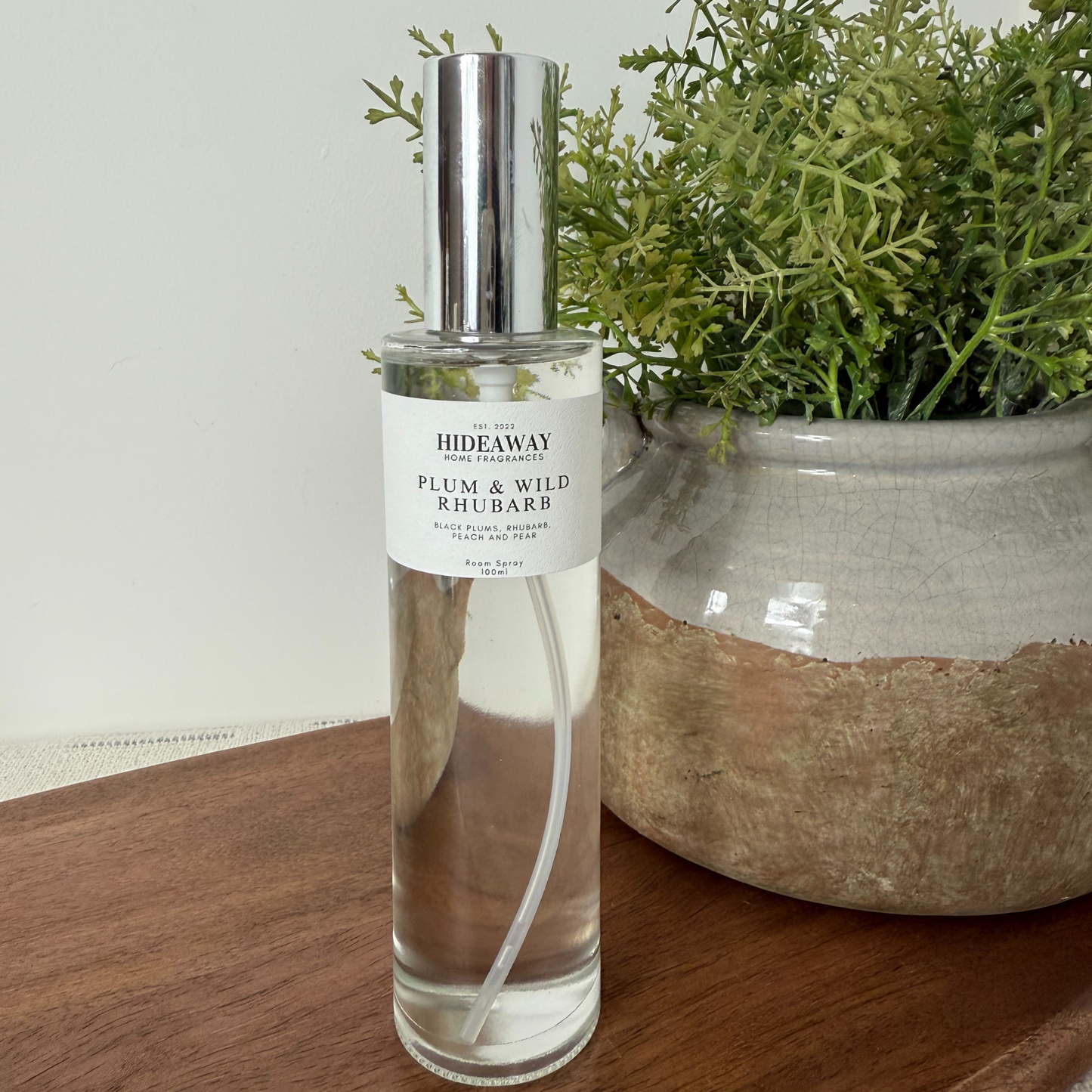 Luxury fruity-aromatic room spray with rhubarb, plum, berries, and soft cedarwood base notes - Hideaway Home Fragrances