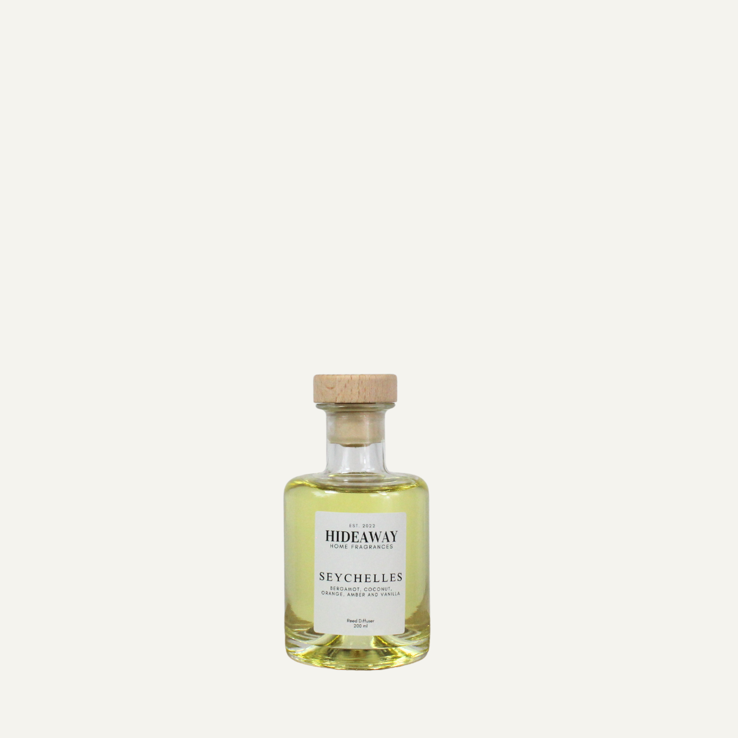 Seychelles home fragrance diffuser, sun warmed tropical scent with coconut almond and amber notes