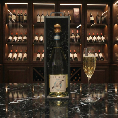 Sea Change Free alcohol-free sparkling drink in eco-friendly, plastic-free packaging, with refreshing elderflower, crisp apple, and summer mint flavours, supporting marine conservation charities.