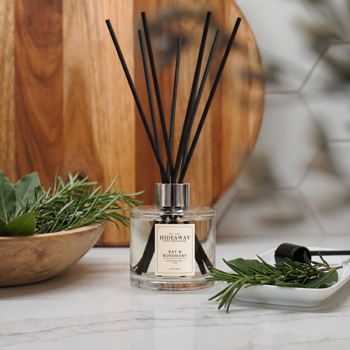 Fresh herbal bay and rosemary reed diffuser by Hideaway Home Fragrances with uplifting citrus and grounding pine
