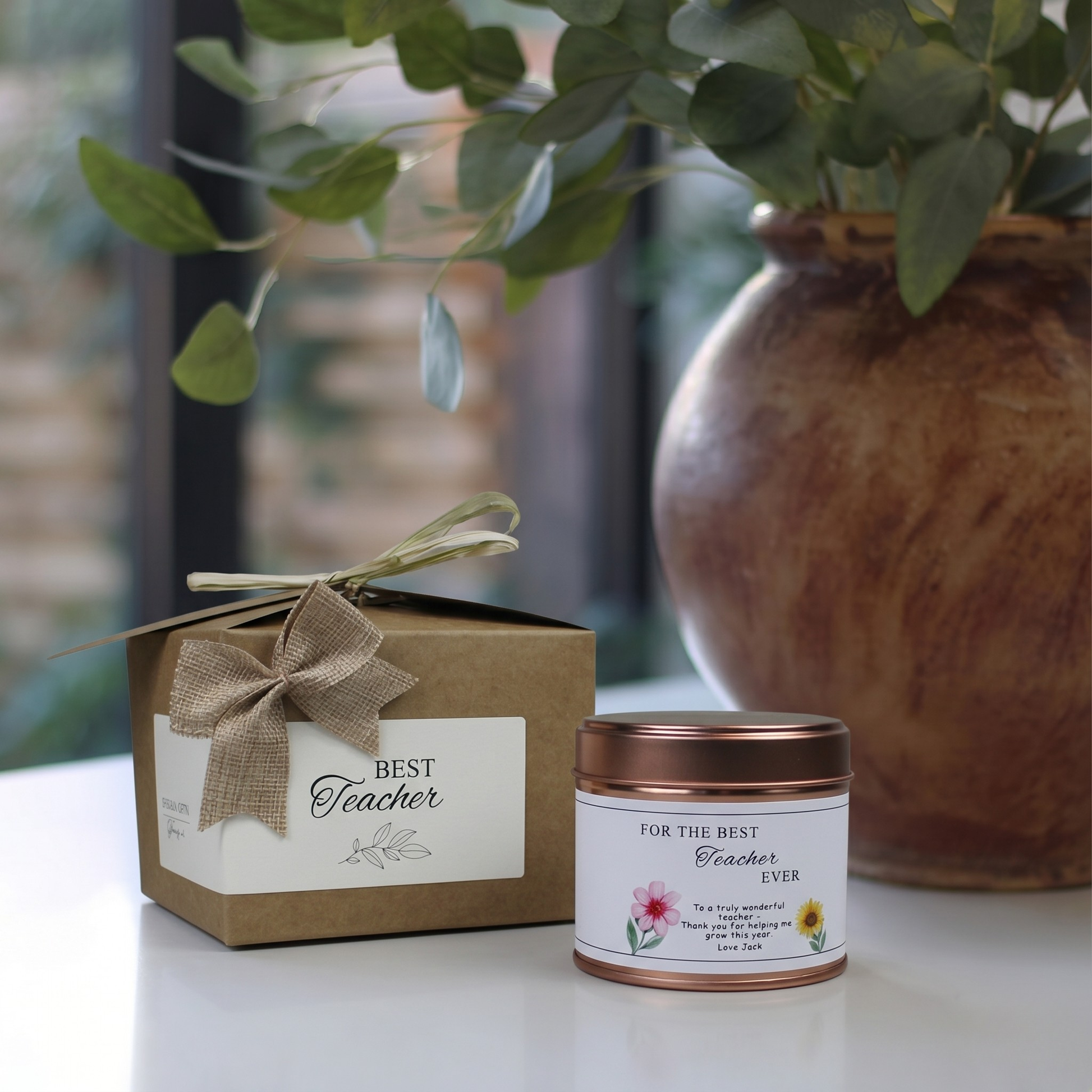 Custom luxury teacher appreciation gift box featuring a botanical illustration thank you educator candle and matching home fragrance diffuser by Hideaway Home Fragrances.