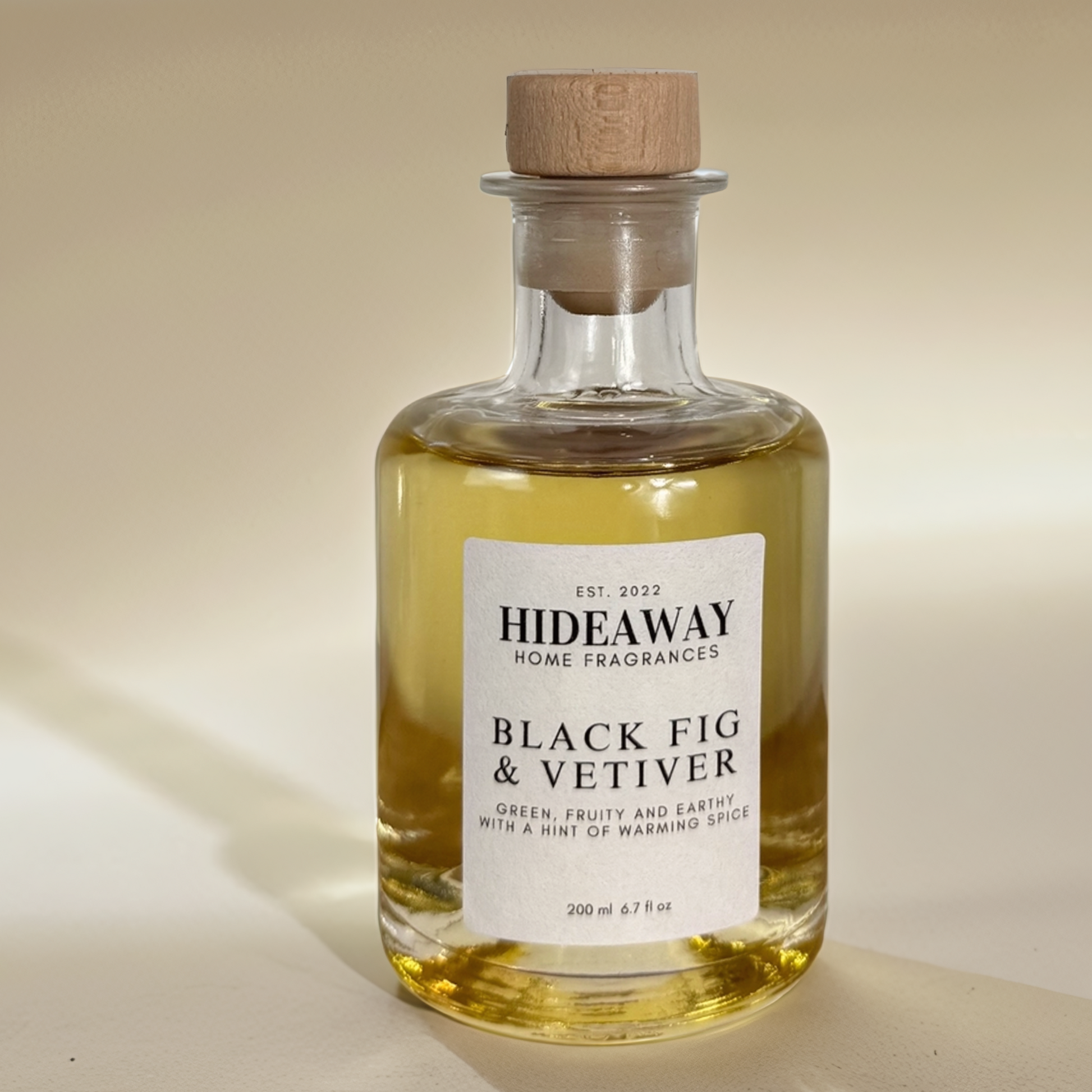 Elegant reed diffuser with fig, vetiver, and moss aroma in a 200ml glass bottle - Hideaway Home Fragrances
