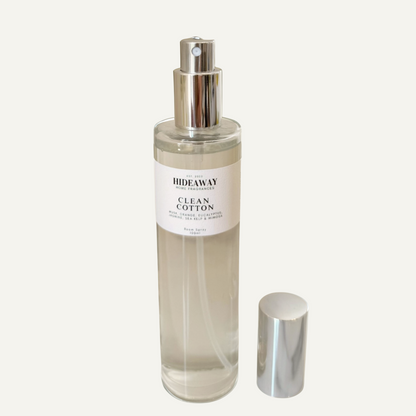Uplifting home fragrance mist in a sleek bottle, perfect for creating a calm, airy space with a clean cotton aroma - Hideaway Home Fragrances