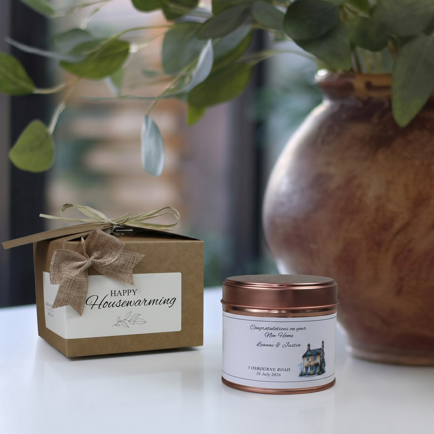 Custom country cottage housewarming gift box featuring a personalized rural moving-in candle and matching home fragrance diffuser by Hideaway Home Fragrances.
