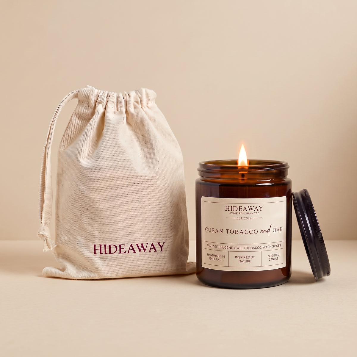 Cuban tobacco and oak amber glass candle with wooden lid by Hideaway Home Fragrances