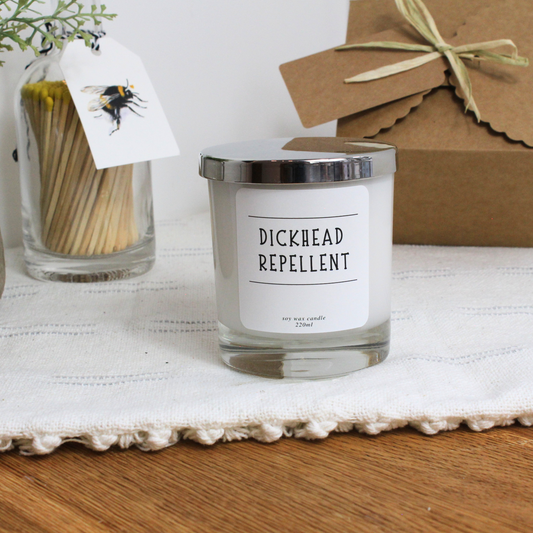 Personalised birthday candle with humorous ‘Dickhead Repellant!’ design – Hideaway Home Fragrances