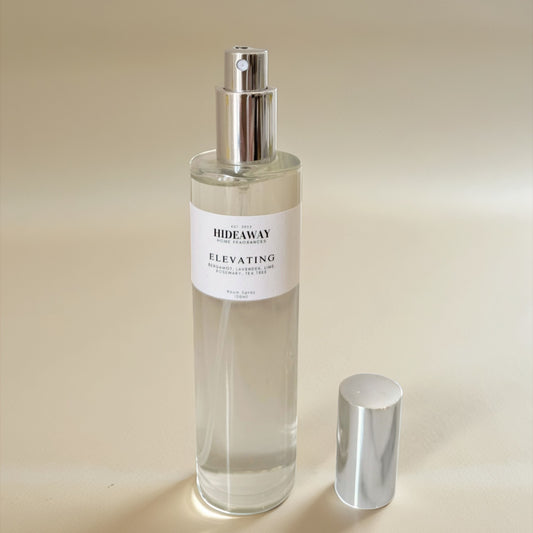 Herbal-citrus essential oil room spray designed to energise, enhance clarity, and promote wellbeing in a sleek 100ml bottle - Hideaway Home Fragrances