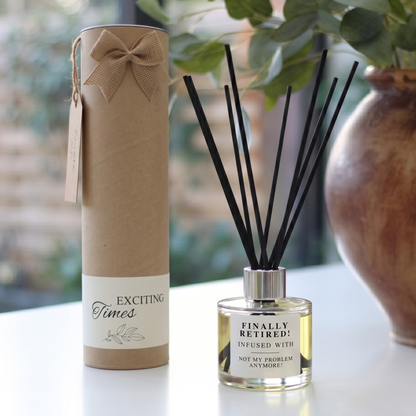 Personalised "Finally Retired" funny quote candle and luxury reed diffuser keepsake gift set, beautifully packaged and ready to gift by Hideaway Home Fragrances.