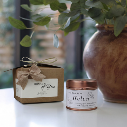 Custom recovery care package gift box featuring a personalized floral illustration candle and matching home fragrance diffuser by Hideaway Home Fragrances.