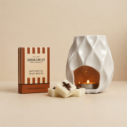 Hideaway Home Fragrances gingerbread botanical wax melts eco-friendly packaging highlighting notes of homemade gingerbread, crisp cookie, and golden caramel