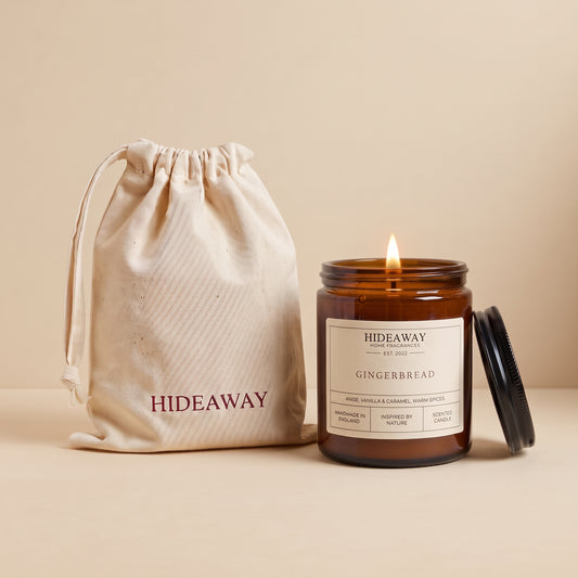 Gingerbread scented amber glass candle with warm spice notes by Hideaway Home Fragrances