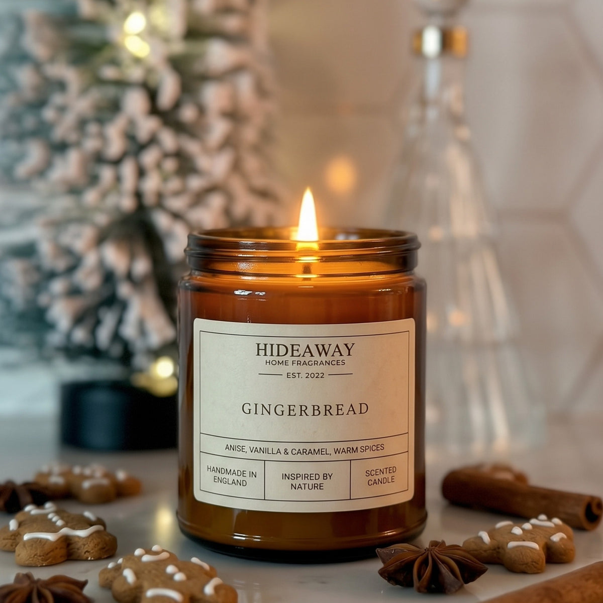 Cosy gingerbread amber glass jar candle styled on a festive winter table, Hideaway Home Fragrances