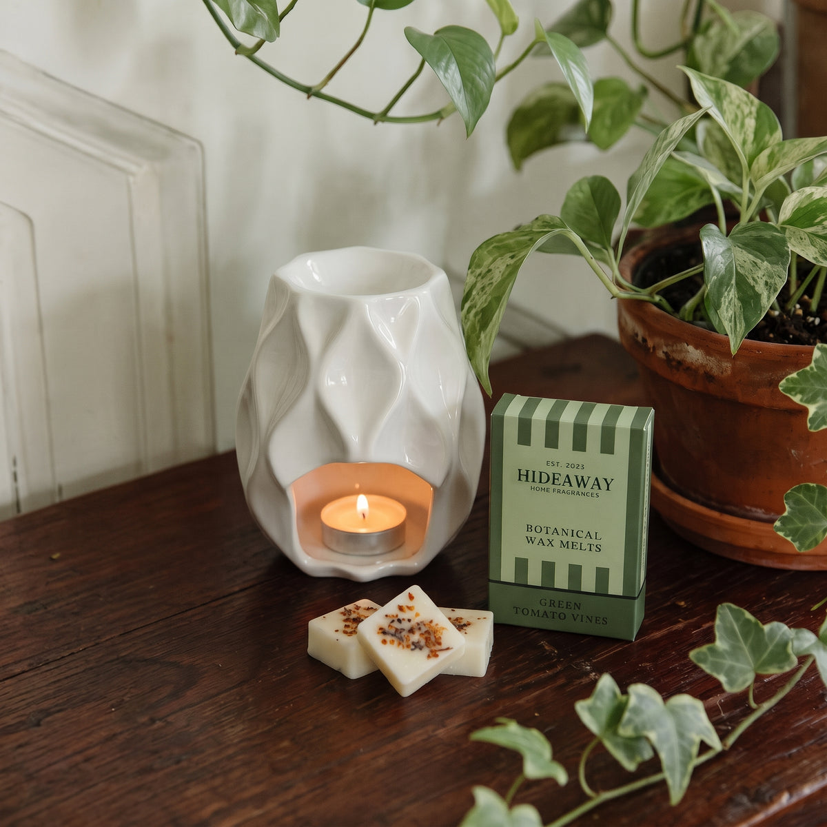 Artisan green tomato vines botanical wax melt snap bar by Hideaway Home Fragrances adorned with real dried botanical foliage
