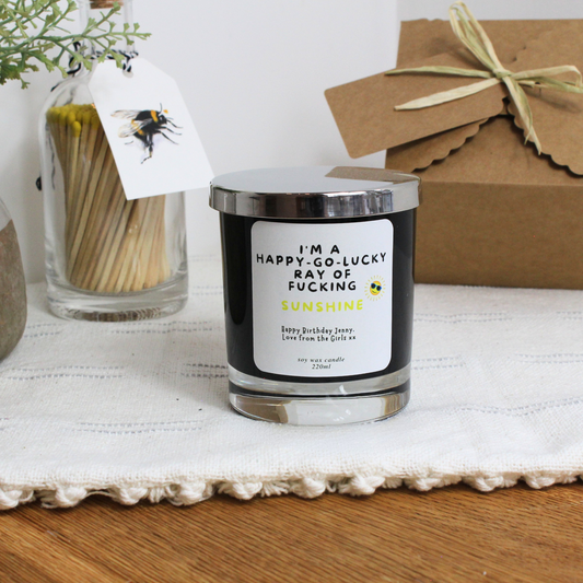 Personalised birthday candle with humorous ‘Happy Funny Go Lucky Fucking Ray of Sunshine’ design – Hideaway Home Fragrances for Happy Funny Go Lucky Fucking Ray of Sunshine – Personalised Birthday Candle