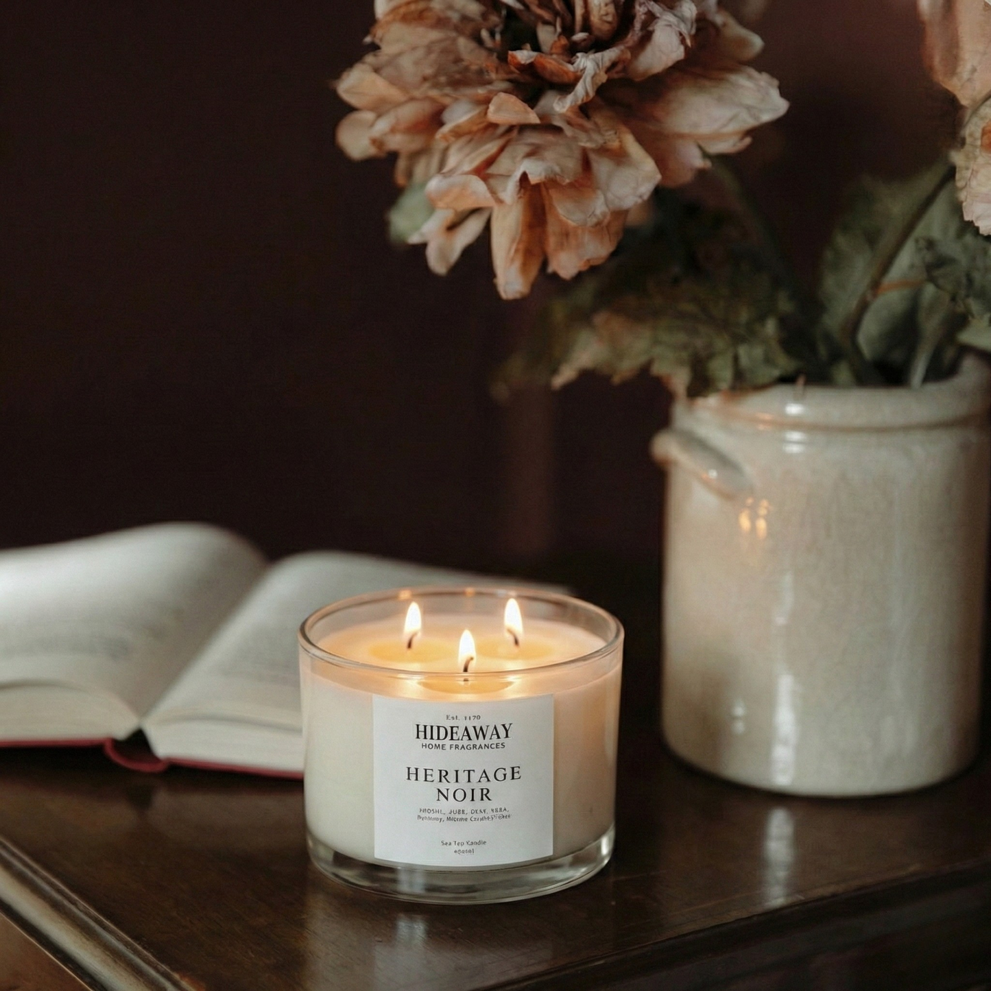 Heritage Noir 3-wick luxury candle with leather, tobacco and cognac notes creating a warm, masculine home atmosphere