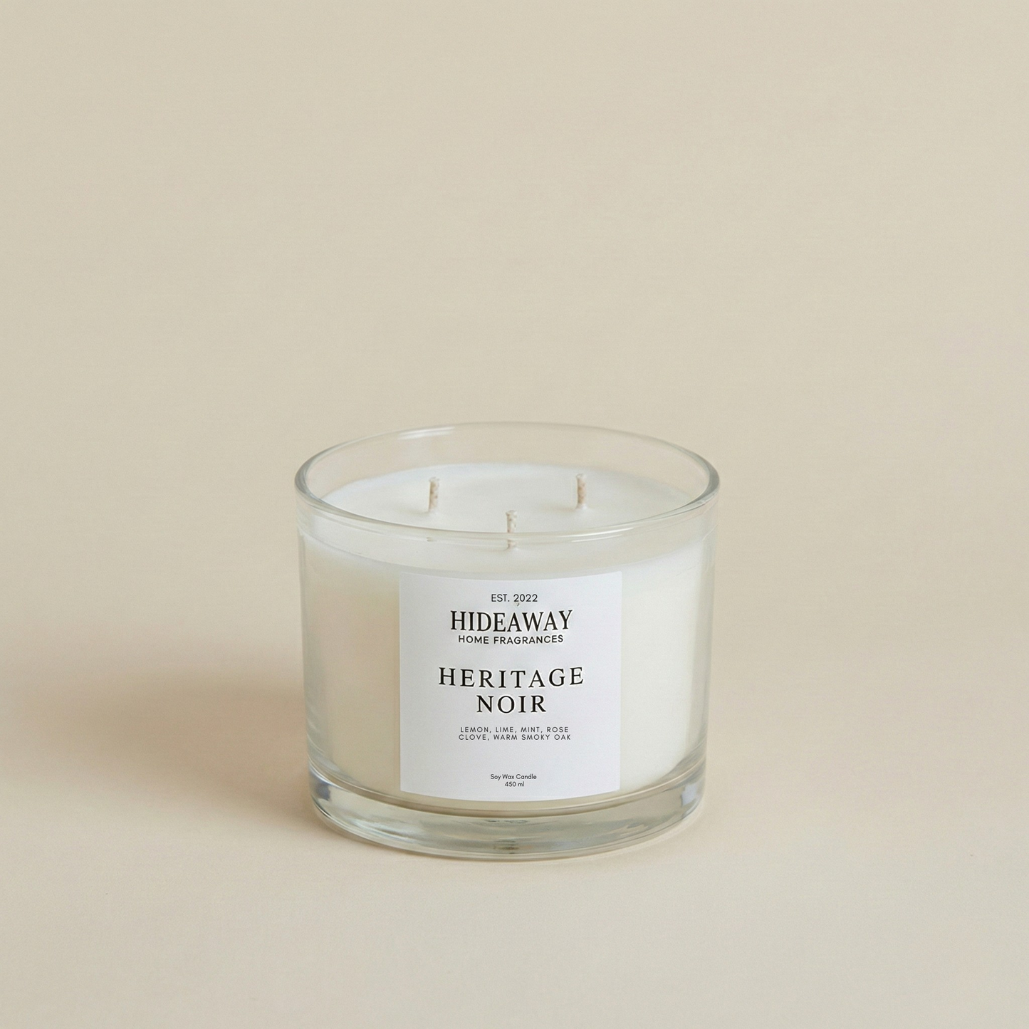 Luxury Heritage Noir soy candle with a rich, sophisticated aroma of spicy clove, earthy vetiver, and warm musk for an atmospheric home fragrance