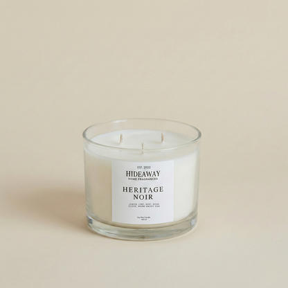 Luxury Heritage Noir soy candle with a rich, sophisticated aroma of spicy clove, earthy vetiver, and warm musk for an atmospheric home fragrance