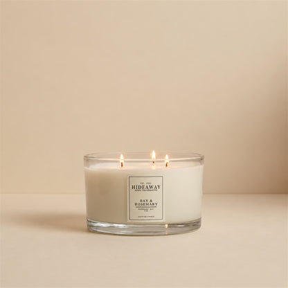 Hideaway Home Fragrances Bay and Rosemary herbal scent collection styled on a wooden shelf for a fresh botanical home atmosphere
