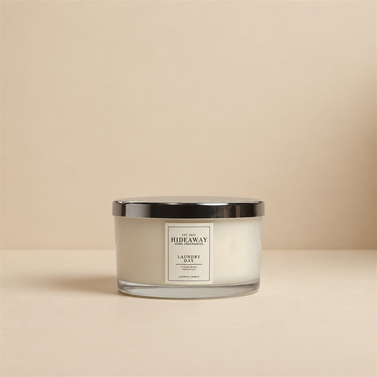 Hideaway Home Fragrances Laundry Day 3 wick scented candle with green apple and rose notes for a clean home fragrance