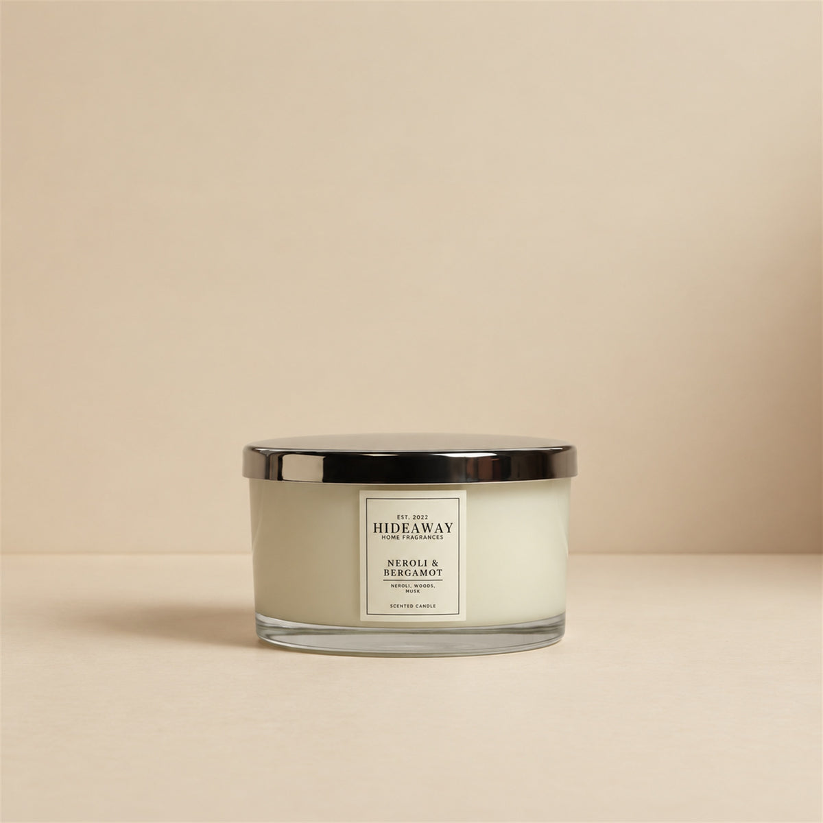 Hideaway Home Fragrances Neroli and Bergamot 3 wick scented candle featuring zesty mandarin, cedarwood, and vanilla notes