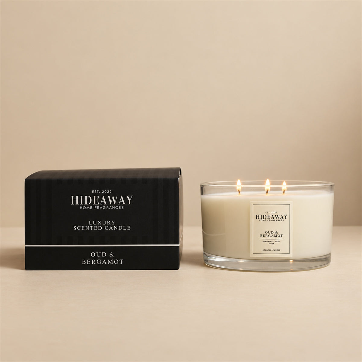 Hideaway Home Fragrances Oud and Bergamot candle with bergamot, citrus, oud, cedarwood, soft spices, amber, and musk notes