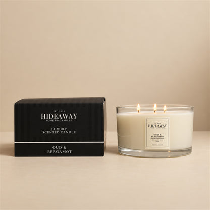 Hideaway Home Fragrances Oud and Bergamot candle with bergamot, citrus, oud, cedarwood, soft spices, amber, and musk notes