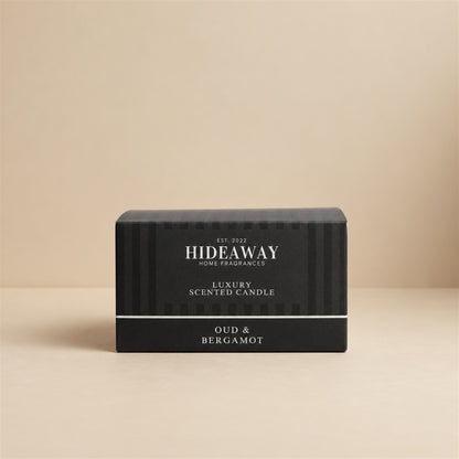 Luxury Hideaway Home Fragrances Oud and Bergamot 3 wick candle featuring citrus, soft spices, dark oud, and musk