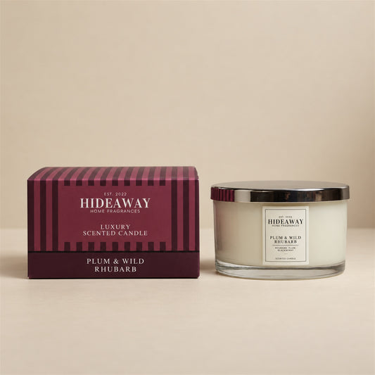 Hideaway Home Fragrances Plum and Wild Rhubarb 3 wick candle in glass jar with fruity tart scent