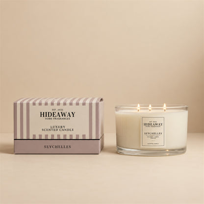 Hideaway Home Fragrances Seychelles candle with coconut, bergamot, amber, jasmine, butter, and warm vanilla notes