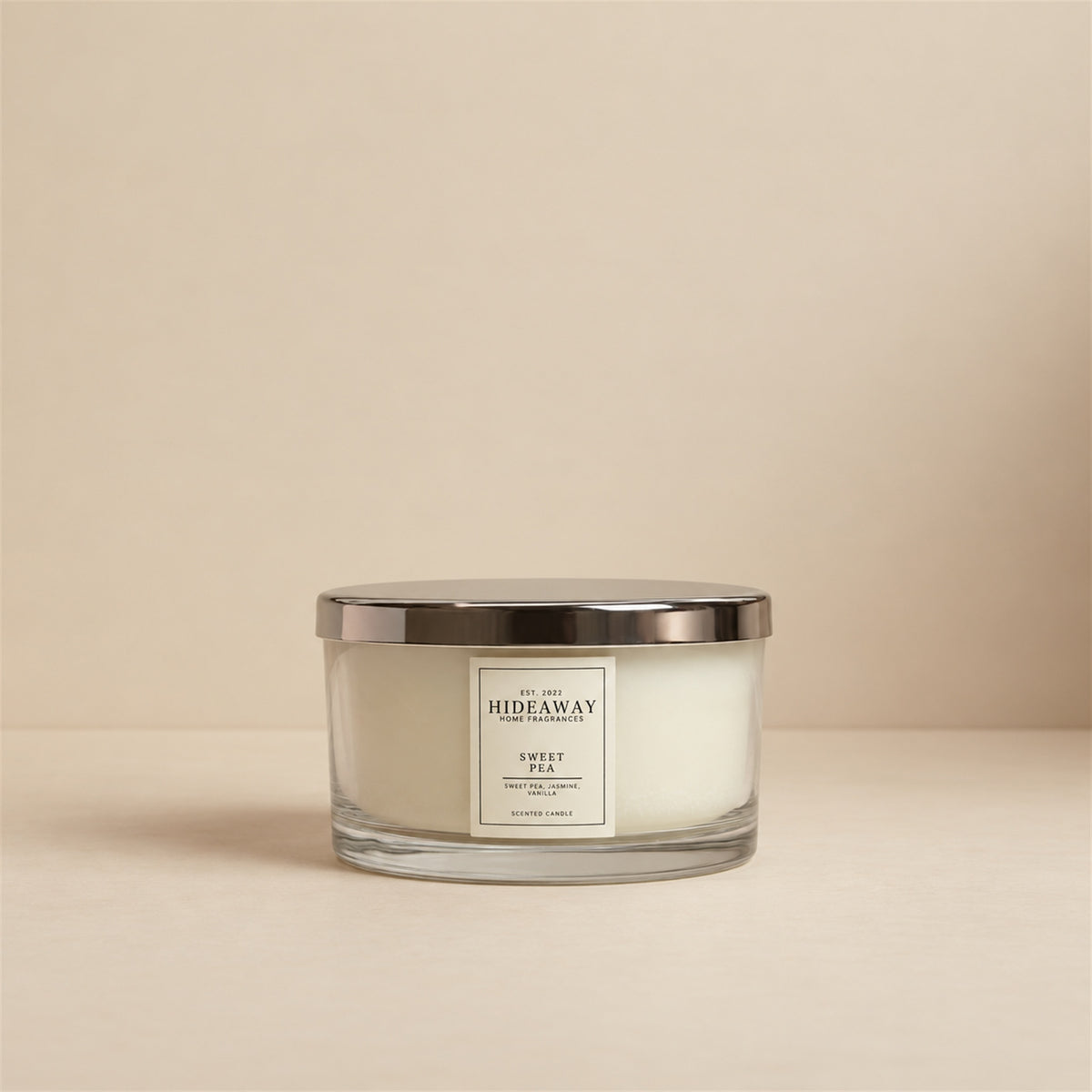 Hideaway Home Fragrances Sweet Pea 3 wick scented candle featuring delicate rose, jasmine, and cozy warm woods
