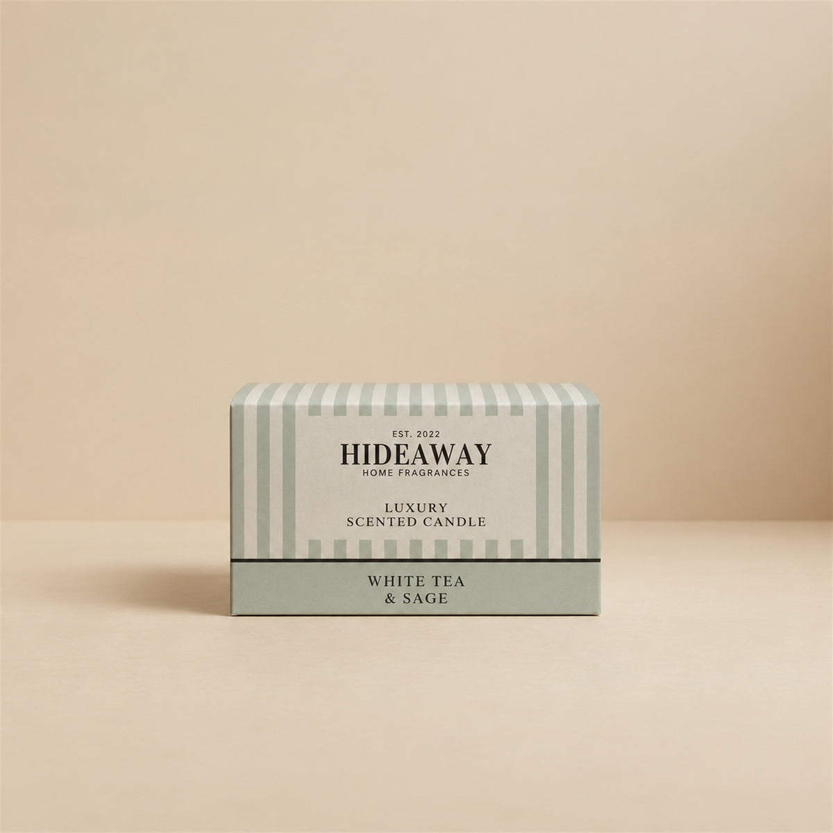 Luxury Hideaway Home Fragrances White Tea and Sage 3 wick candle with notes of herbal thyme, crisp mint, white tea, and oolong