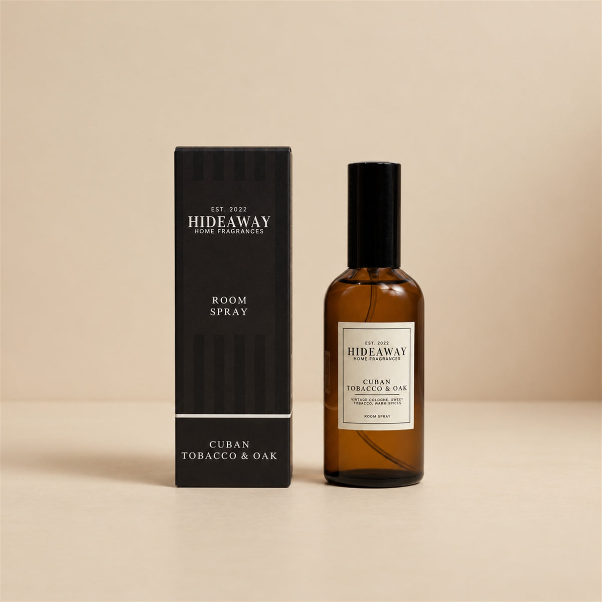 Hideaway Home Fragrances cuban tobacco and oak room spray bottle isolated on a plain background for home scent collections.