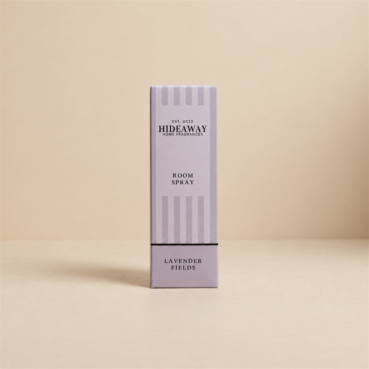 Luxury boxed packaging and bottle for Hideaway Home Fragrances lavender fields room spray for aromatherapy and home relaxation.