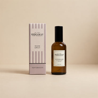Hideaway Home Fragrances seychelles room spray bottle centred against a bright, minimalist studio backdrop.