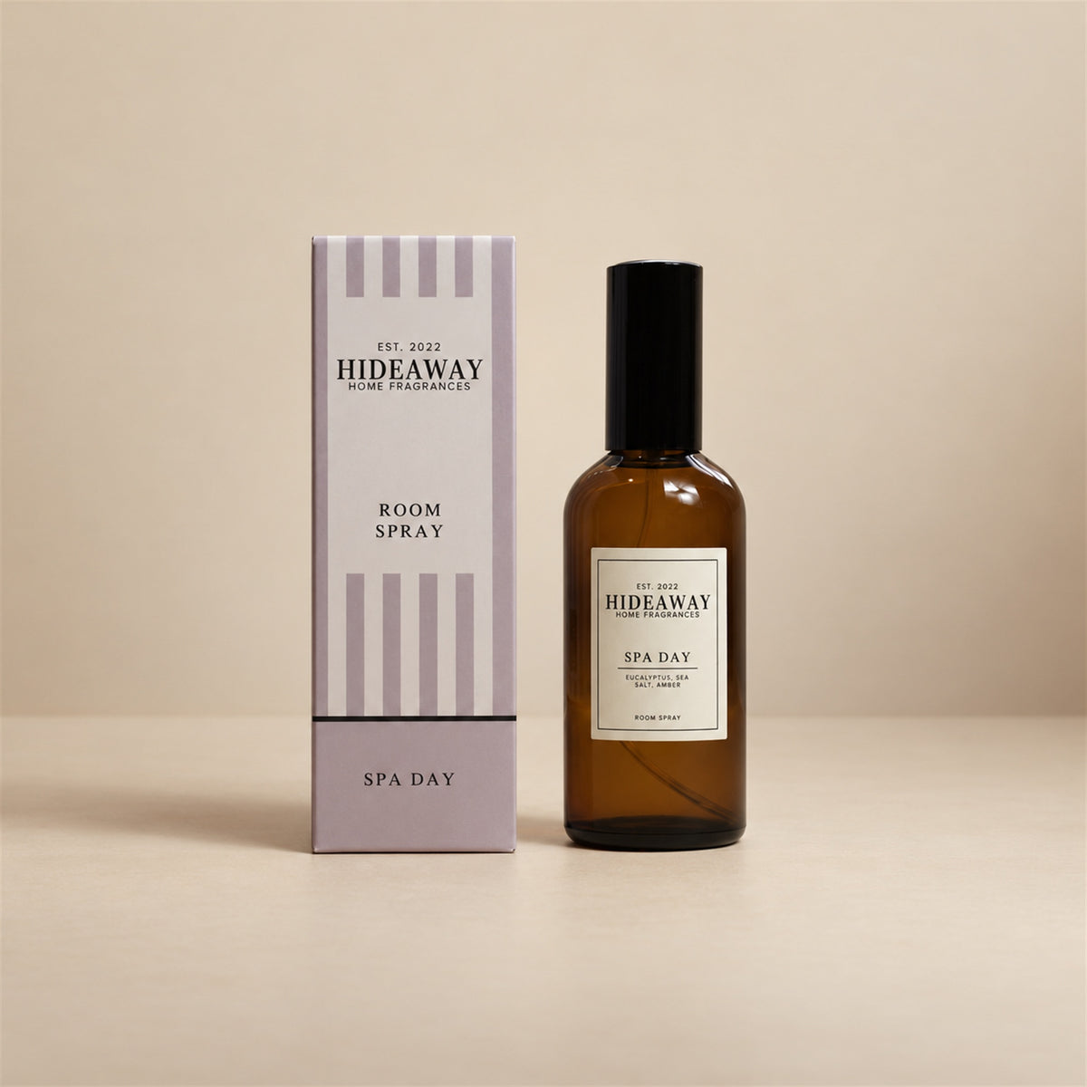 Hideaway Home Fragrances spa day room spray bottle centered against a crisp, neutral studio background.