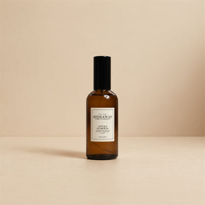 Fine mist released from the Hideaway Home Fragrances spiced pumpkin room spray bottle to diffuse warm clove and spiced pumpkin aromas into the home.