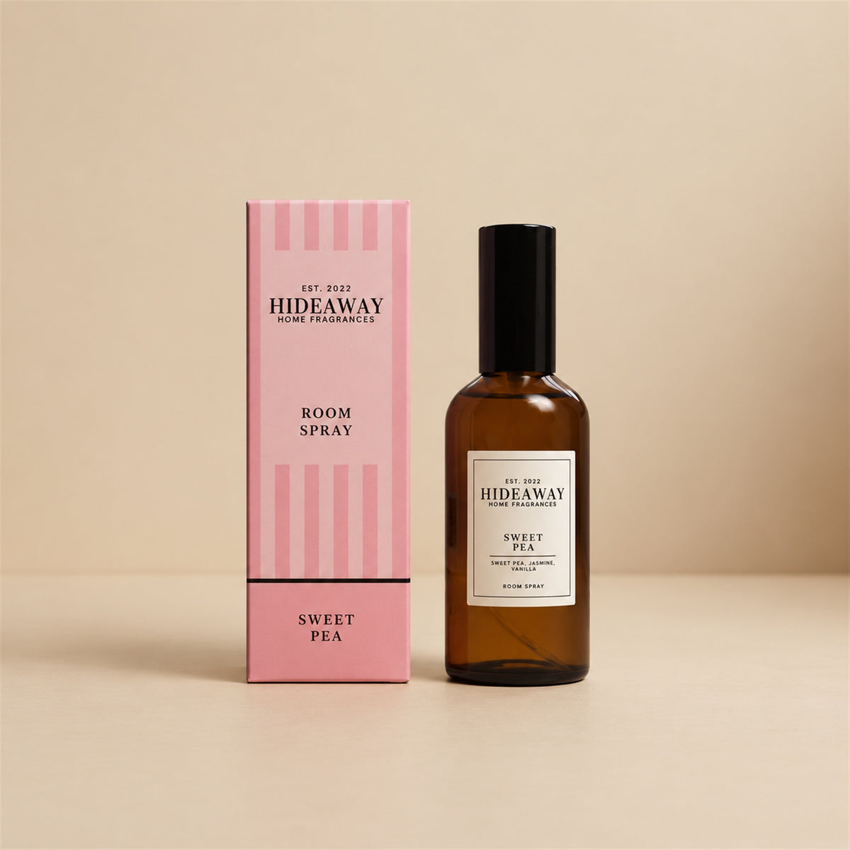 Hideaway Home Fragrances sweet pea room spray bottle standing against a clean, bright studio backdrop.