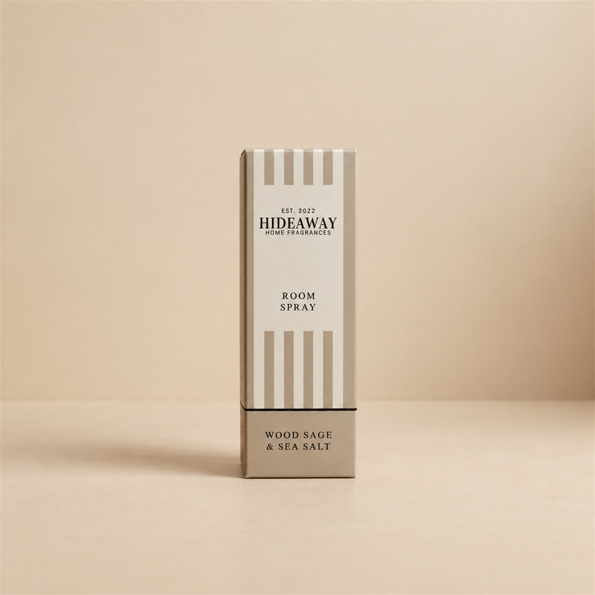 Luxury packaged gift box and matching bottle for Hideaway Home Fragrances wood sage and sea salt room spray highlighting fresh coastal home fragrance notes.