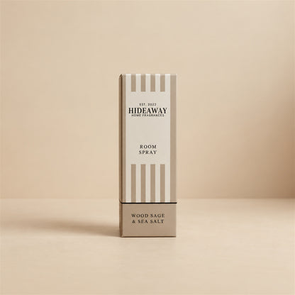 Luxury packaged gift box and matching bottle for Hideaway Home Fragrances wood sage and sea salt room spray highlighting fresh coastal home fragrance notes.