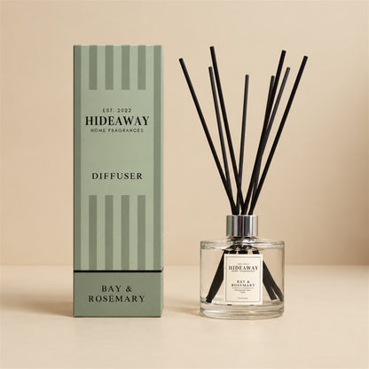 Hideaway Home Fragrances bay and rosemary reed diffuser with citrus, lavender, and pine notes in a room