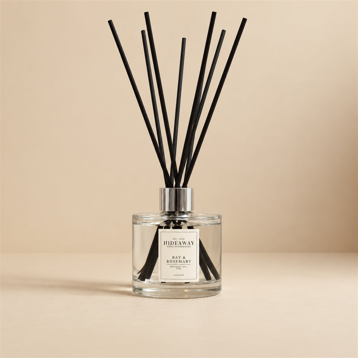 Bay and rosemary reed diffuser by Hideaway Home Fragrances featuring citrus, bay leaf, lavender, pine needle, and musk notes