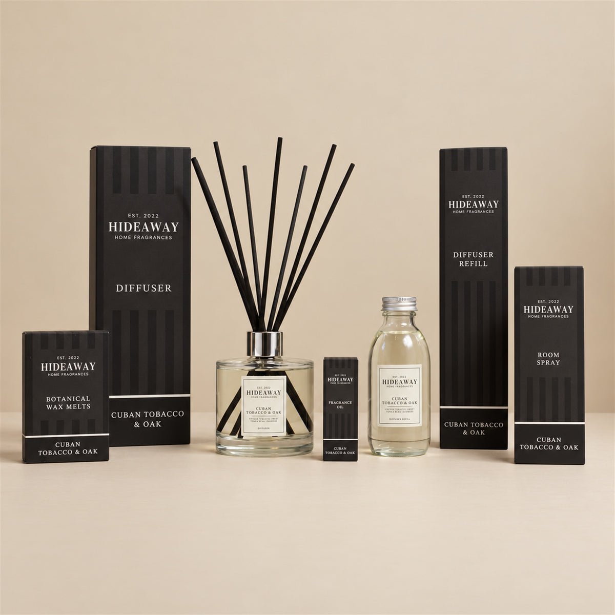 Hideaway Home Fragrances cuban tobacco and oak collection including diffusers, candles, wax melts, sprays, and oils