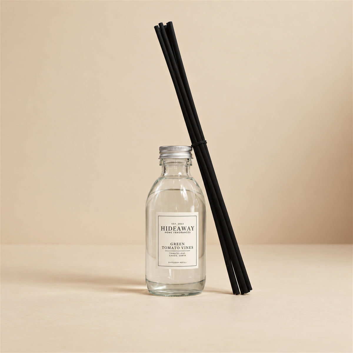 Green tomato vines diffuser oil refill by Hideaway Home Fragrances with tagette, orange blossom, and amber
