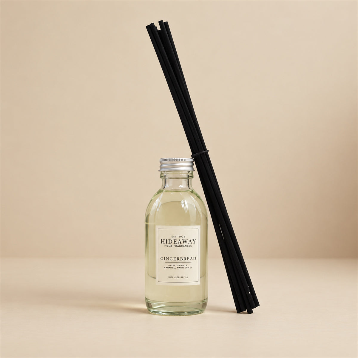 Gingerbread and warm cinnamon diffuser oil refill by Hideaway Home Fragrances with maple, caramel, and cookie notes